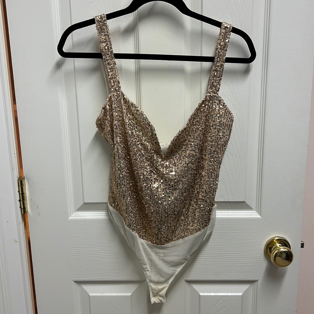 Free People sequin bodysuit in gold. Size medium.